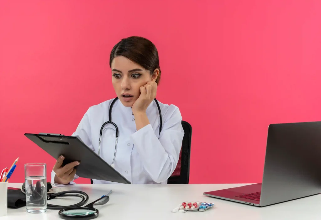 A female doctor conducting a telehealth video consultation from her modern private medical clinic, expertly addressing patient concerns and processing secure online payment claims for medical services, showcasing efficient remote healthcare solutions for easy booking and reliable virtual doctor visits.